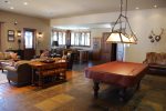 Inside of the clubhouse - full kitchen, pool table, and cozy sofas 